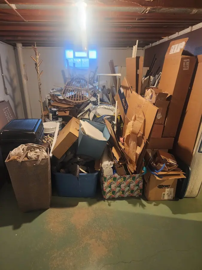 Roll-off dumpster container at job site for 15 Yard Dumpster Rental in Doffing